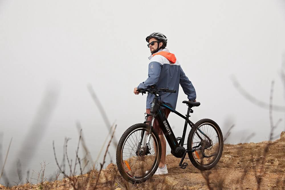 a man goes mountain biking