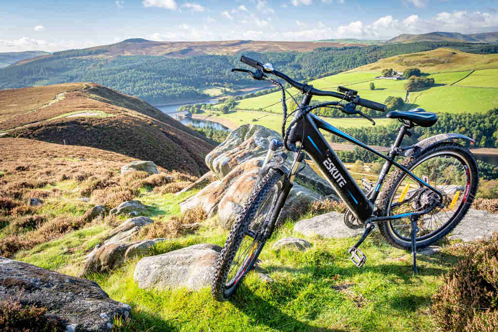 black electric mountain bike at the mountain top