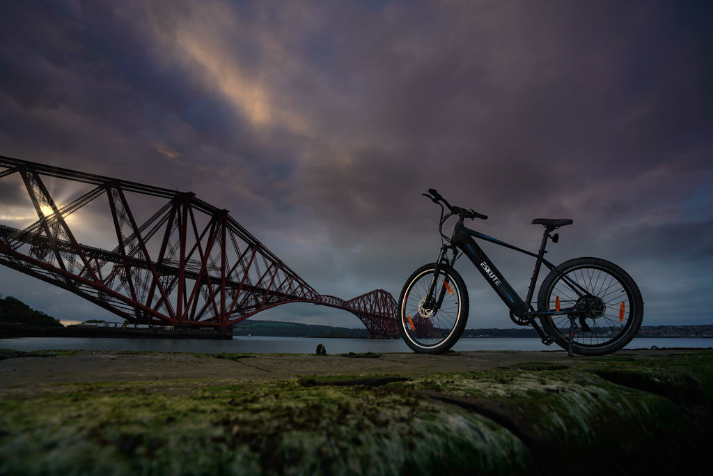 ebike is beside the riverside when night comes