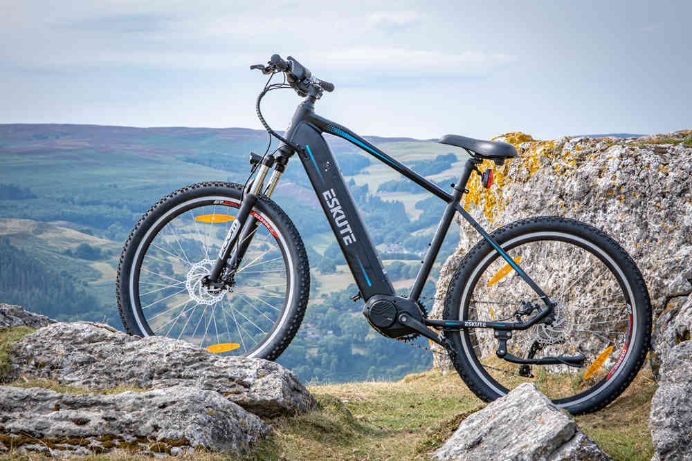 netuno pro mid drive electric bike on the mountain top