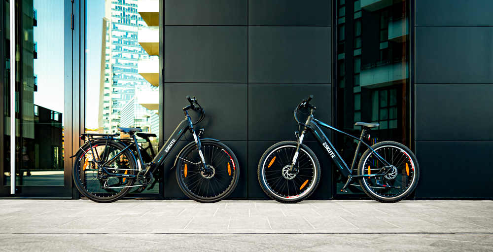Eskute e-bikes leaning against the building wall