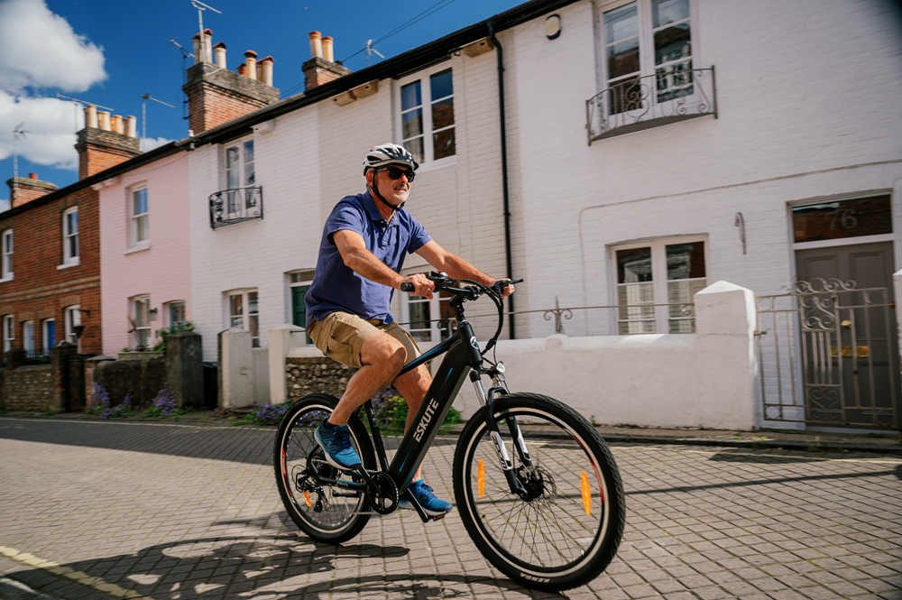 a man goes for a test ride from an local ebike shop