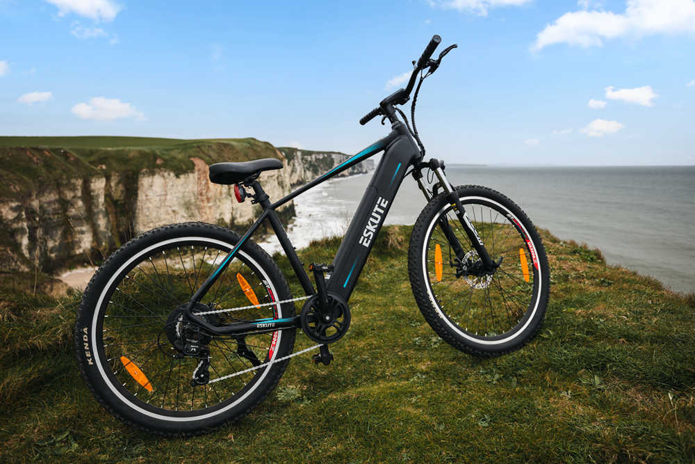mountain ebike with front suspension is on cliff at the seaside